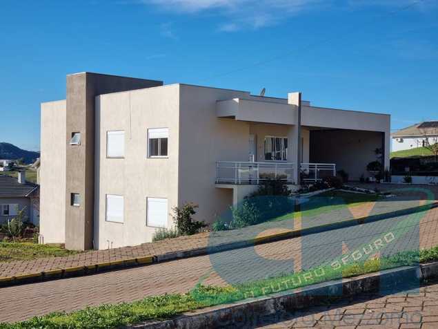 {{layout.imobiliaria.imb_razaosocial}}