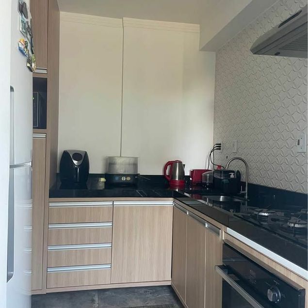 {{layout.imobiliaria.imb_razaosocial}}