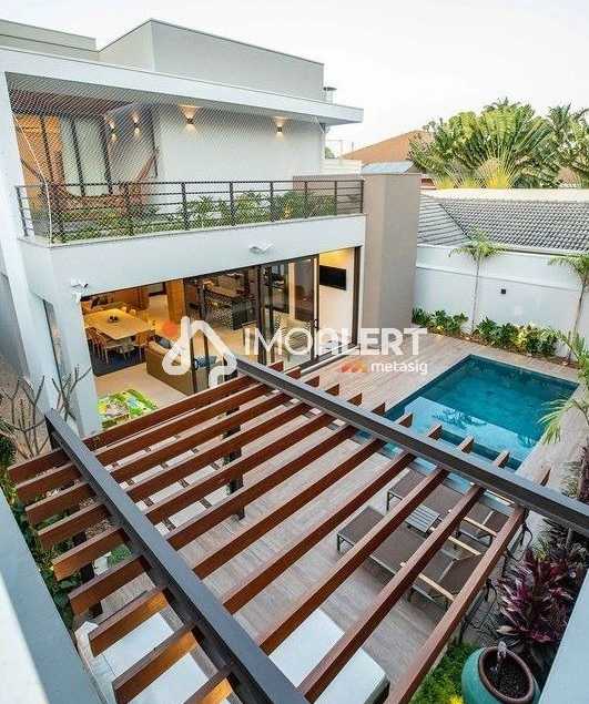 {{layout.imobiliaria.imb_razaosocial}}