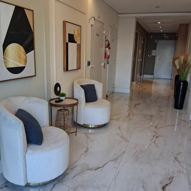 {{layout.imobiliaria.imb_razaosocial}}