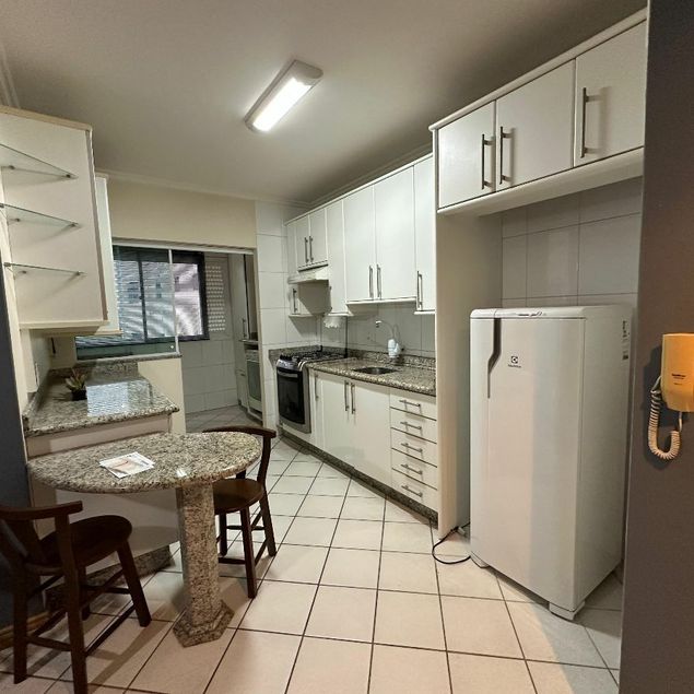 {{layout.imobiliaria.imb_razaosocial}}