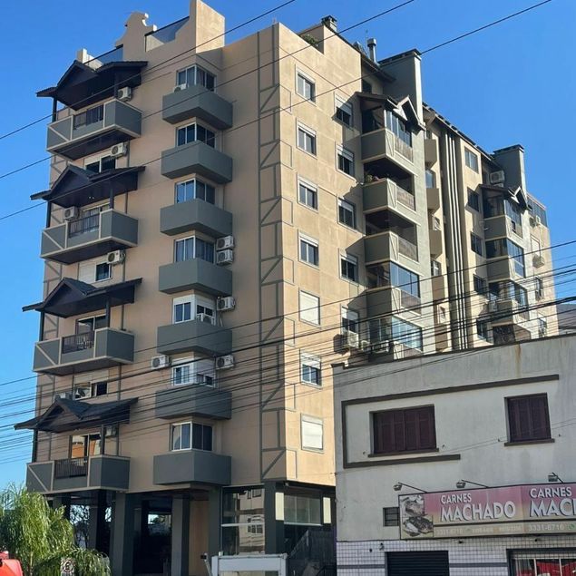 {{layout.imobiliaria.imb_razaosocial}}