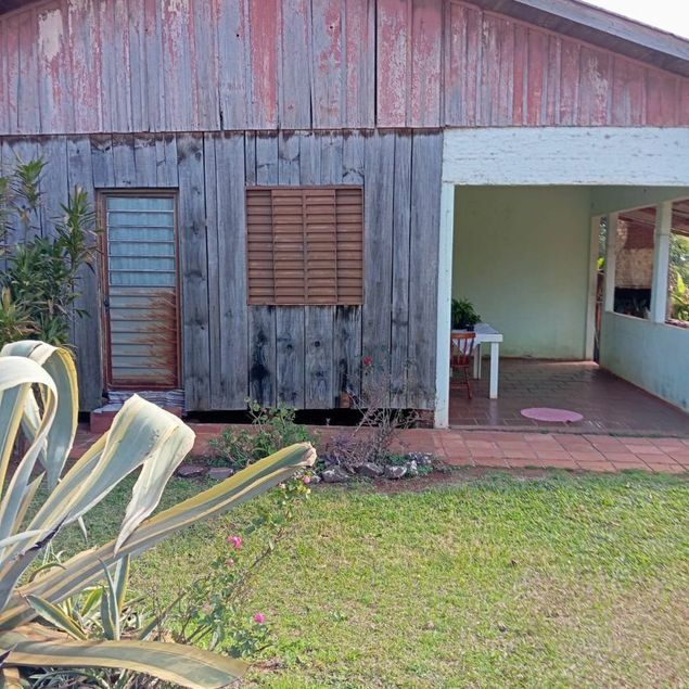 {{layout.imobiliaria.imb_razaosocial}}