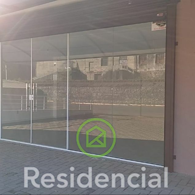 {{layout.imobiliaria.imb_razaosocial}}