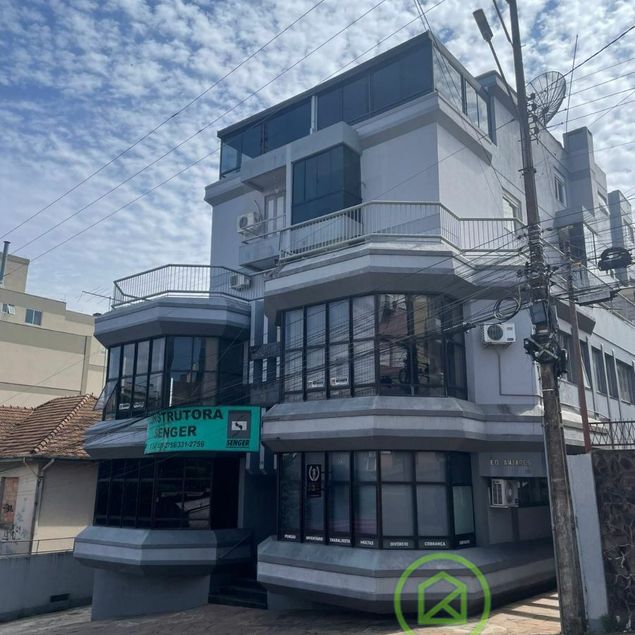 {{layout.imobiliaria.imb_razaosocial}}