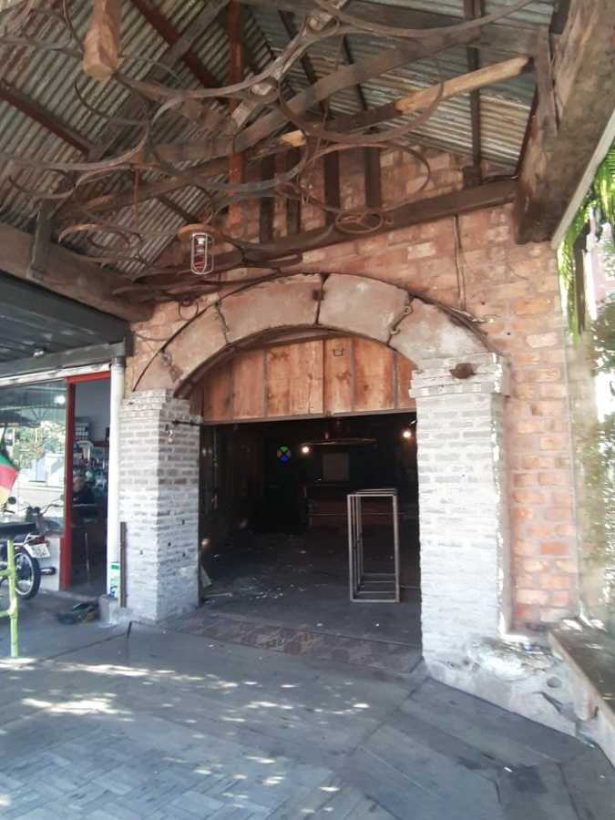 {{layout.imobiliaria.imb_razaosocial}}