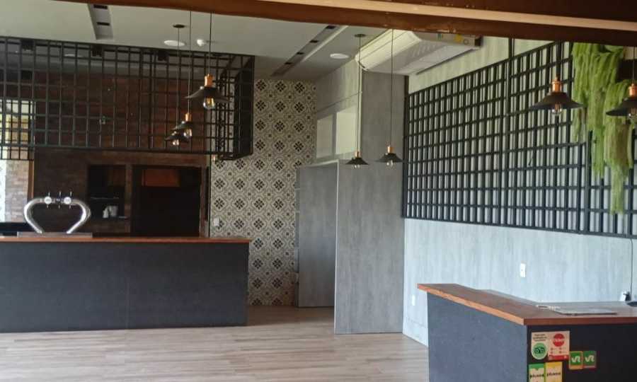 {{layout.imobiliaria.imb_razaosocial}}