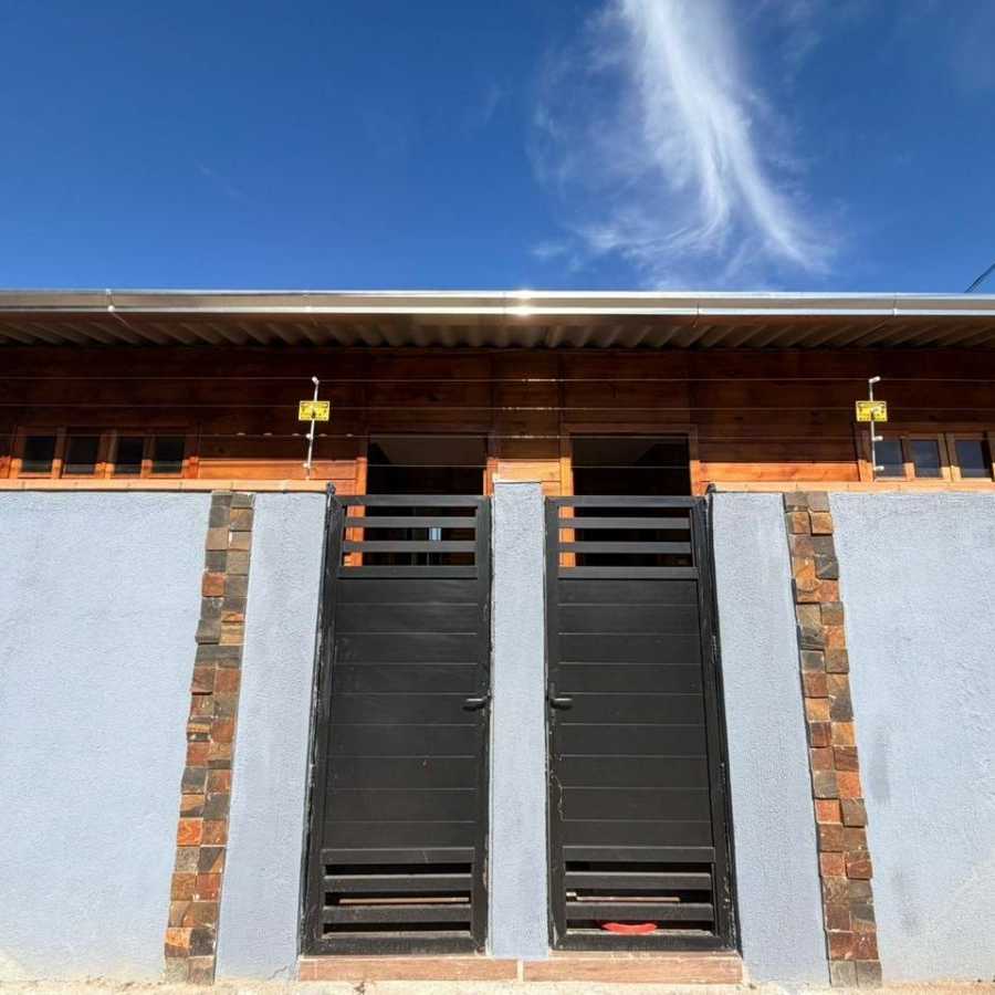 {{layout.imobiliaria.imb_razaosocial}}