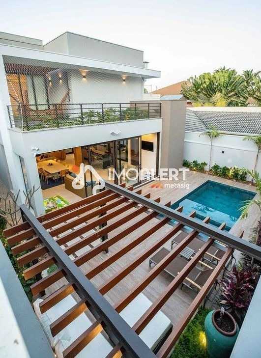 {{layout.imobiliaria.imb_razaosocial}}